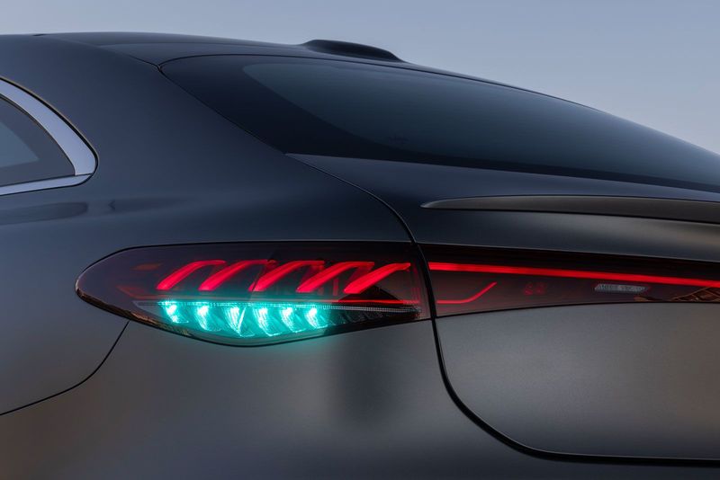 A view of the turquoise light on the Mercedes EQS car