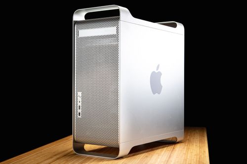 An aluminium Power Mac G5 with a black background