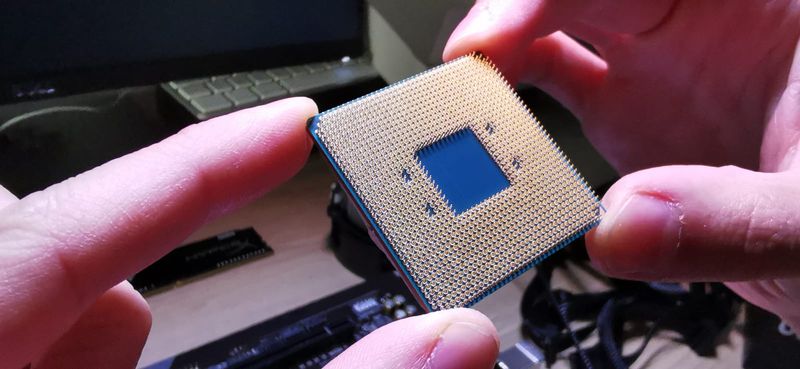 a closeup view of the new Ryzen 5 processor in my hands